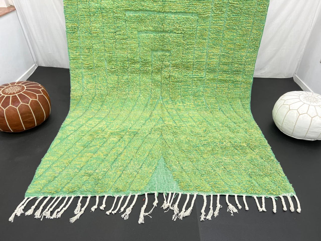 Green Moroccan wool rug with carved geometric lines and sculpted texture