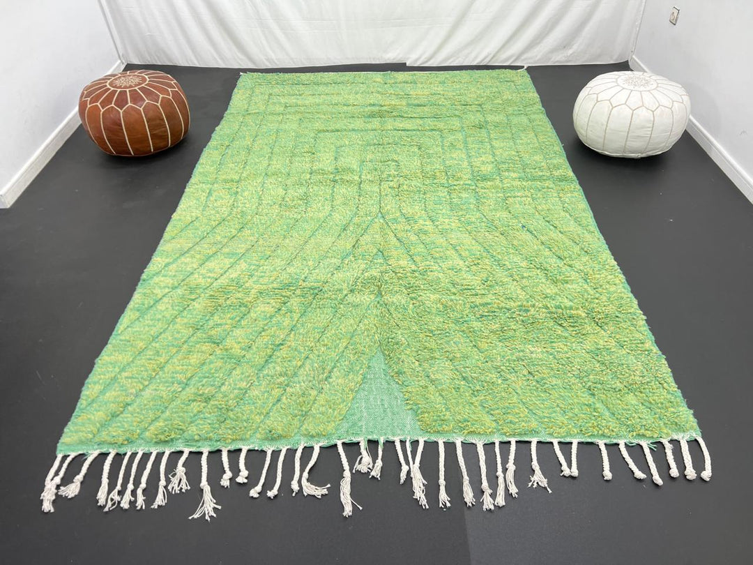 Green Moroccan wool rug with carved geometric lines and sculpted texture