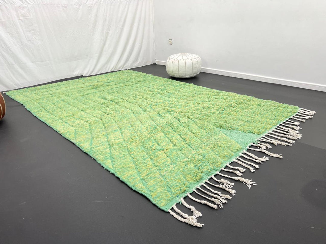 Green Moroccan wool rug with carved geometric lines and sculpted texture