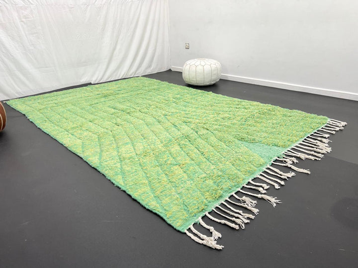 Green Moroccan wool rug with carved geometric lines and sculpted texture
