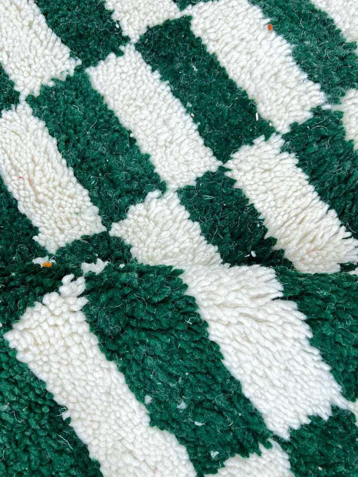 Green and white checkerboard Moroccan wool rug handmade by Berber artisans
