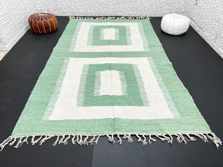 Handwoven Moroccan wool rug in green and cream white with geometric square pattern – modern flatweave Berber carpet