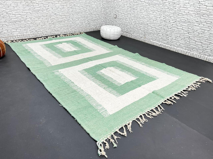 Handwoven Moroccan wool rug in green and cream white with geometric square pattern – modern flatweave Berber carpet