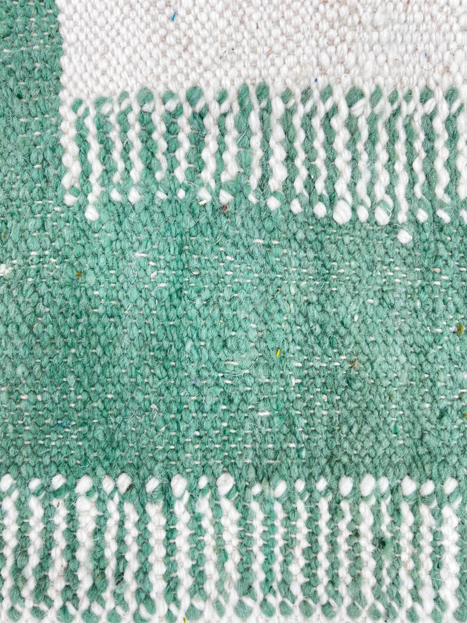 Handwoven Moroccan wool rug in green and cream white with geometric square pattern – modern flatweave Berber carpet
