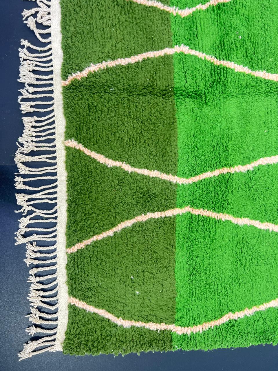 Green Moroccan runner rug handwoven in moss and olive wool with flowing ivory lines