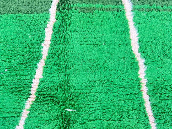 Green Moroccan runner rug handwoven in moss and olive wool with flowing ivory lines