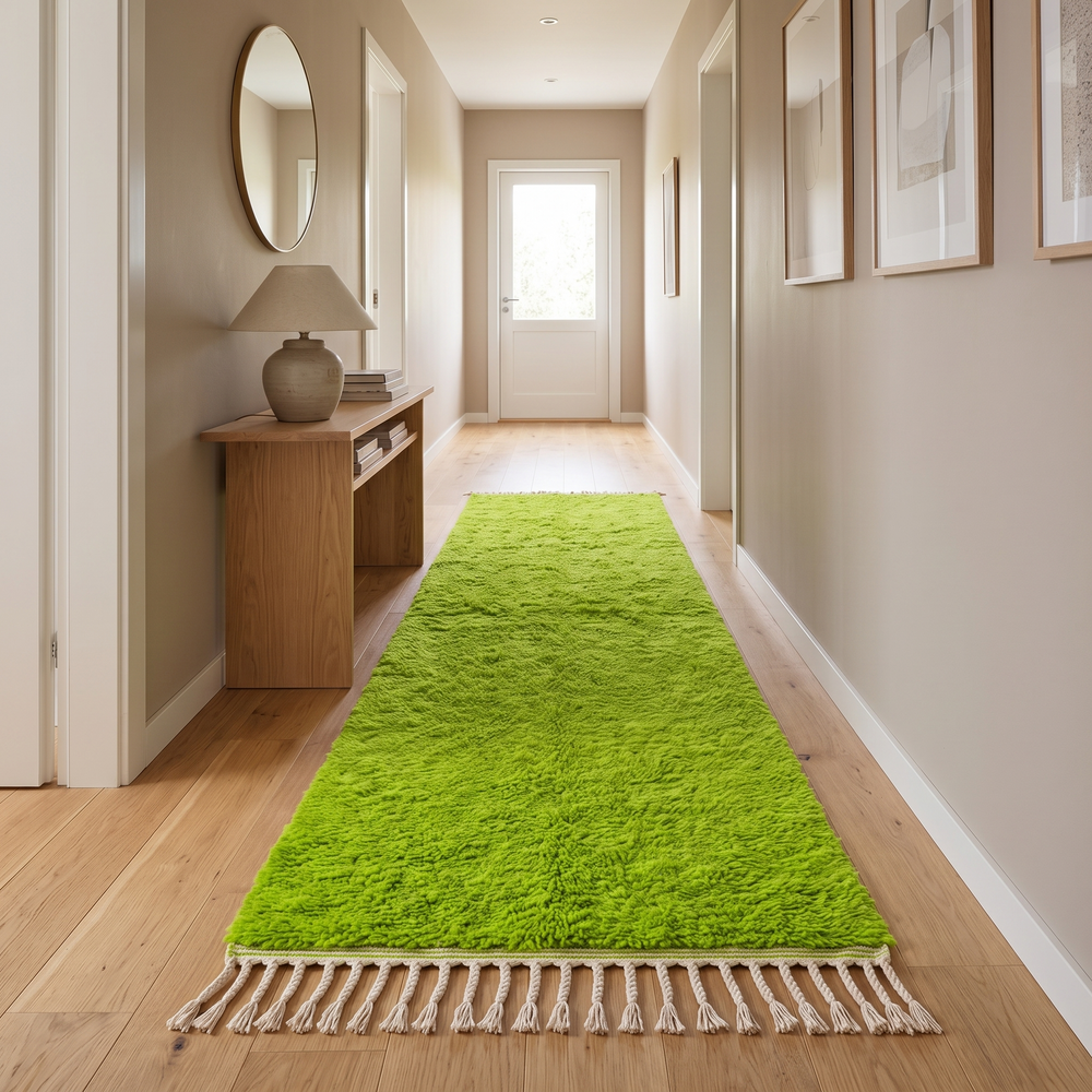 Green Moroccan runner rug in handmade wool shag texture with fringed ends
