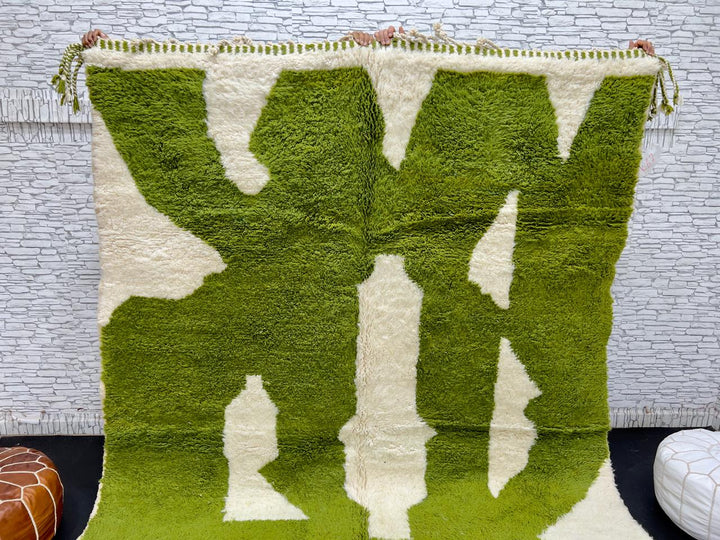 Handmade Moroccan wool rug with bold green and cream abstract geometric pattern