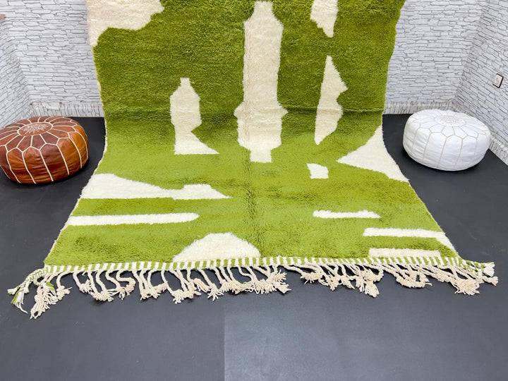 Handmade Moroccan wool rug with bold green and cream abstract geometric pattern