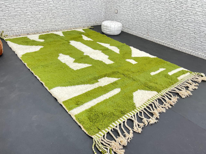 Handmade Moroccan wool rug with bold green and cream abstract geometric pattern
