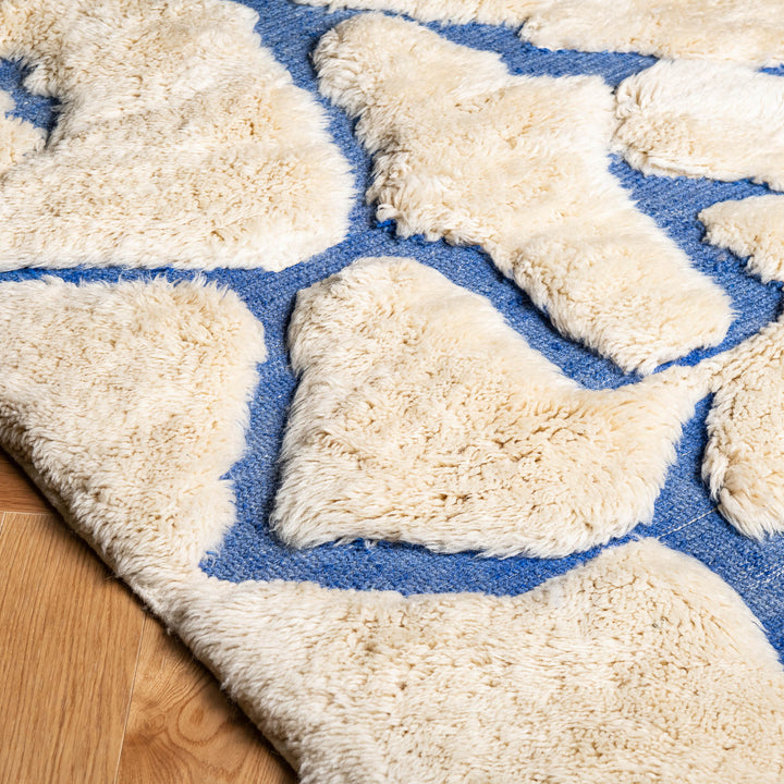 Handmade Beige Moroccan Rug with Abstract Blue Line Motifs