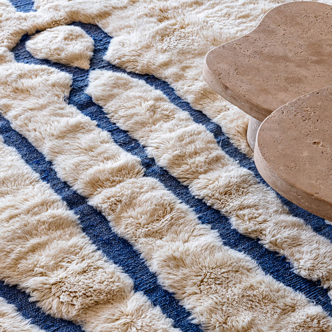 Handmade Beige Moroccan Rug with Abstract Blue Line Motifs