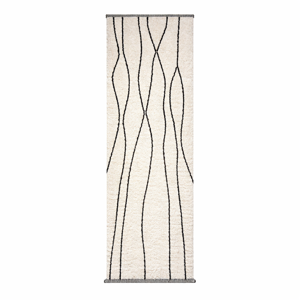 Handmade Moroccan wool runner rug in white with black abstract lines, minimalist design for hallway or entryway.