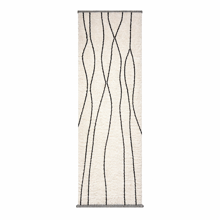 Handmade Moroccan wool runner rug in white with black abstract lines, minimalist design for hallway or entryway.
