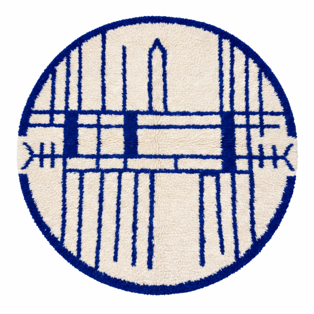 Handmade round Moroccan wool rug with blue Berber geometric pattern on ivory natural wool background