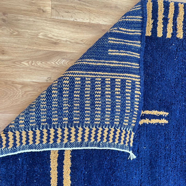 Blue Moroccan Berber runner rug with geometric wool pattern and fringes, handmade hallway runner