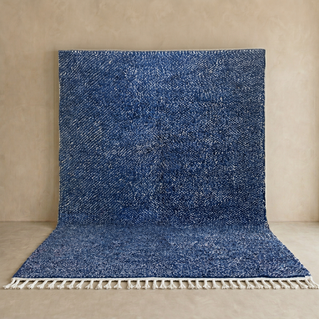 Indigo blue Moroccan wool rug with subtle textured pattern