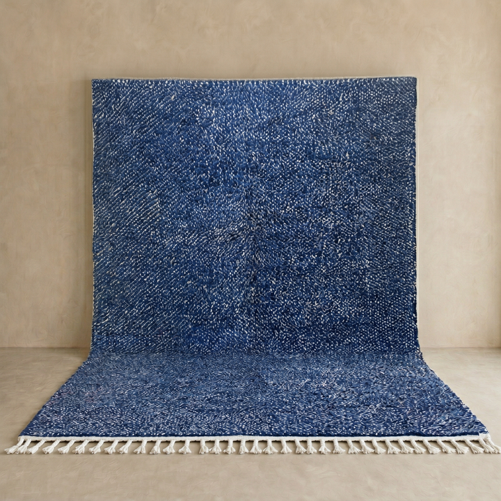 Indigo blue Moroccan wool rug with subtle textured pattern