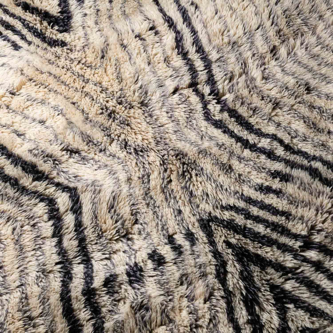 Handmade Moroccan Wool Rug with Black Chevron Illusion Pattern