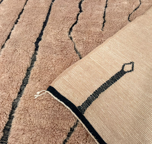 Handmade beige Moroccan wool shag rug with carved Berber geometric lines