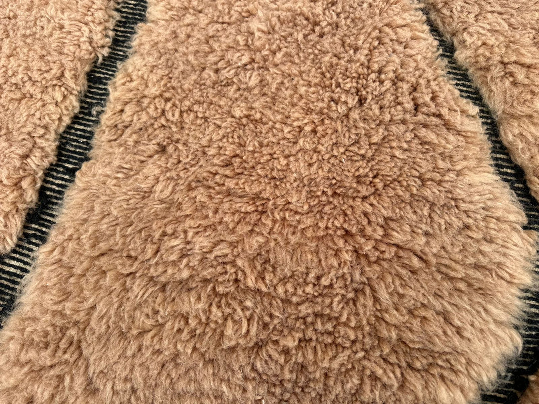 Handmade beige Moroccan wool shag rug with carved Berber geometric lines