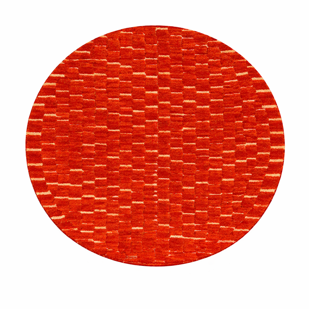Handmade round Moroccan wool rug with rich textured surface and modern minimalist design.