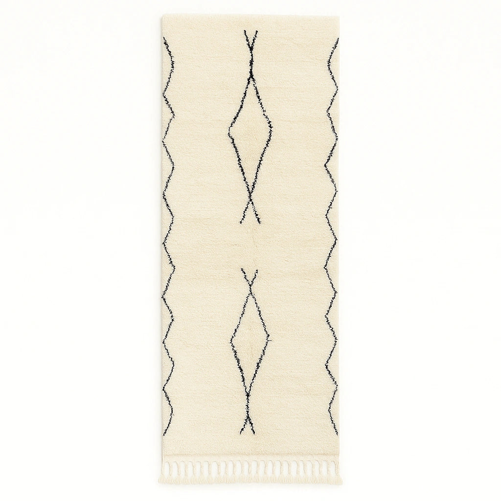 Handwoven white and black Moroccan wool runner rug with minimalist geometric lines, inspired by Beni Ourain design