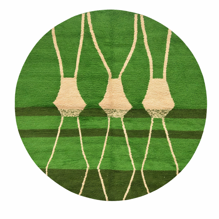 Round handmade Moroccan wool rug in green with ivory Berber pattern