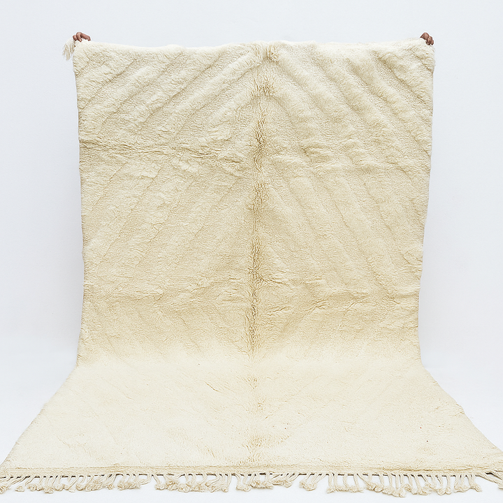 Handwoven cream Beni Ourain Moroccan wool rug with subtle chevron line pattern