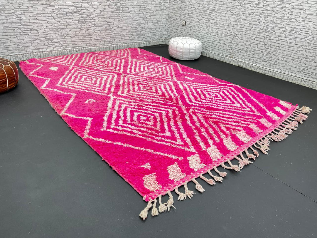 Hot pink Moroccan wool rug with ivory diamond geometric design handmade by Berber artisans