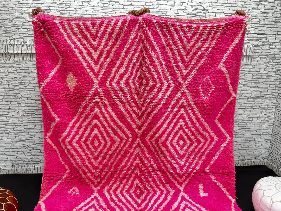 Hot pink Moroccan wool rug with ivory diamond geometric design handmade by Berber artisans