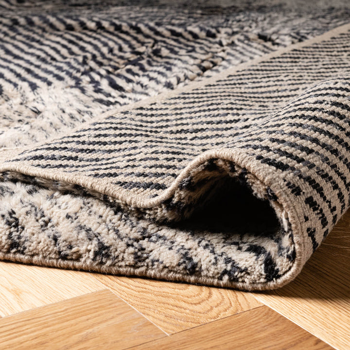 Hypnotic Beni Mrirt Rug – Black & Beige Wool Artwork