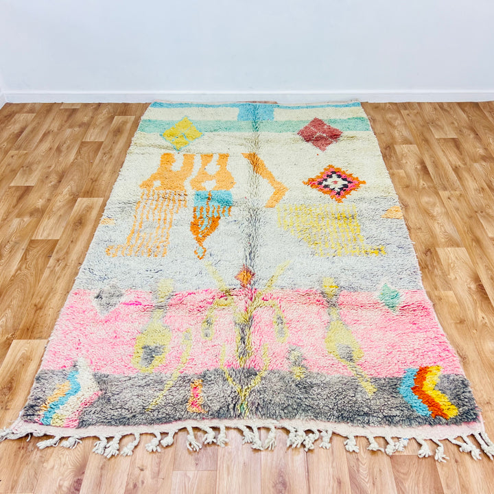 Vintage Moroccan wool rug with tribal symbols and colorful diamonds, handmade by Berber women, measuring 8.5x5.1 ft.