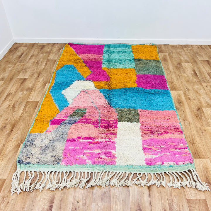 Colorful Moroccan Berber rug with fuchsia, turquoise, and saffron blocks, 100% wool, 246 x 153 cm, perfect for eclectic spaces.