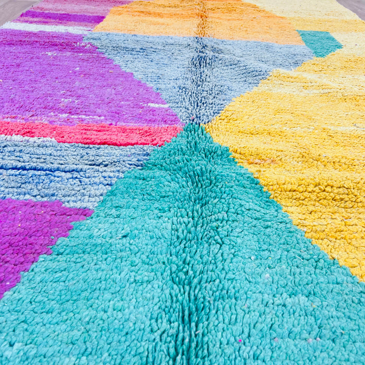 Vintage Moroccan abstract rug in orange, pink, yellow, and mint green. Handwoven Berber wool rug with bold designs from Morocco.