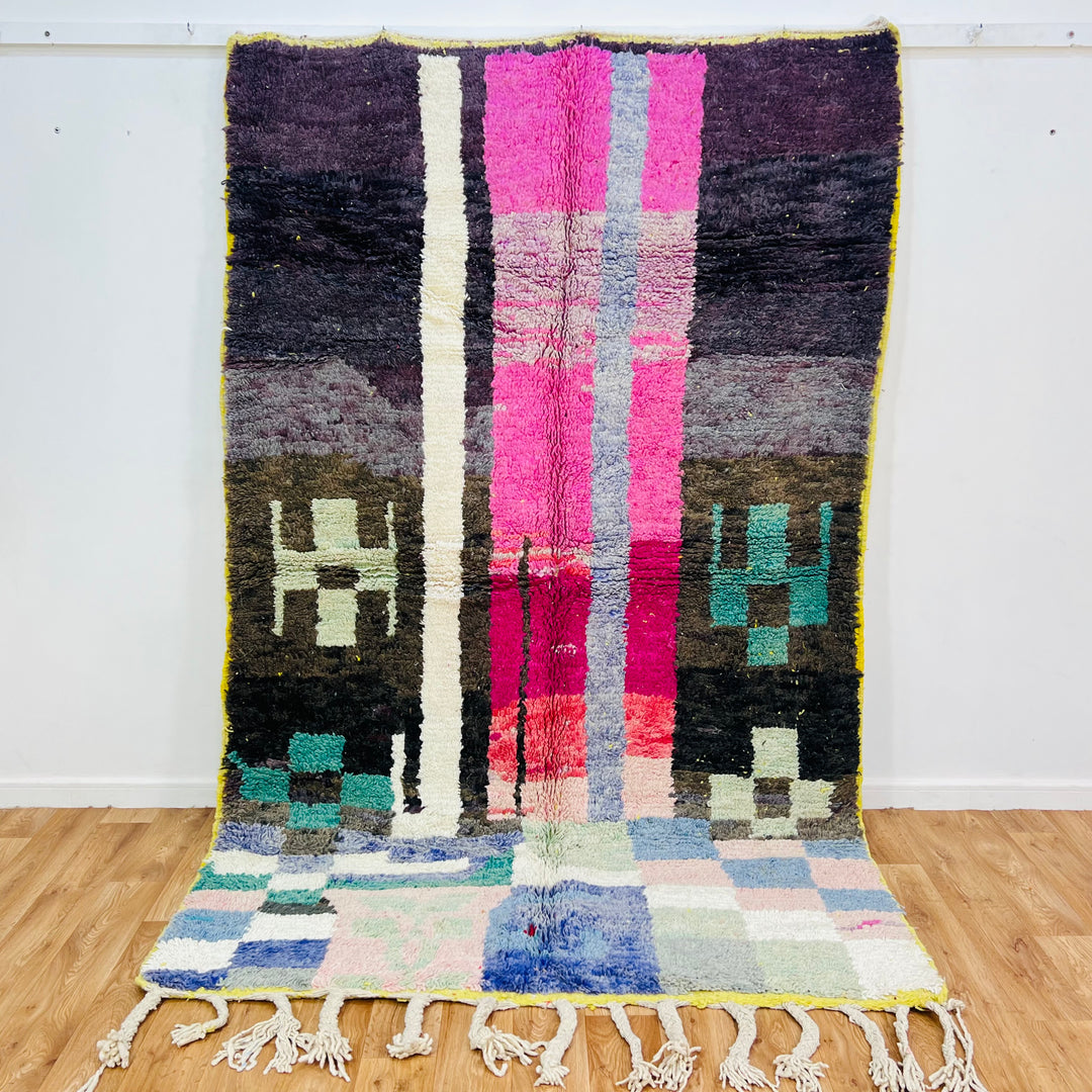 Colorful abstract vintage Moroccan rug with geometric motifs in vibrant tones, 263 x 169 cm, handmade by Berber artisans.
