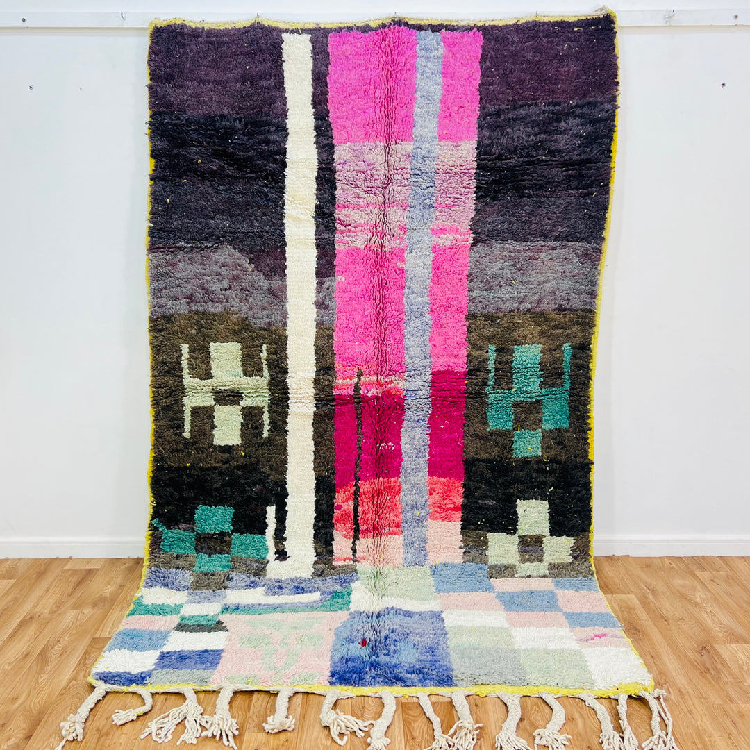 Colorful abstract vintage Moroccan rug with geometric shapes in vibrant tones, size 263 x 169 cm. Handmade by Berber artisans.