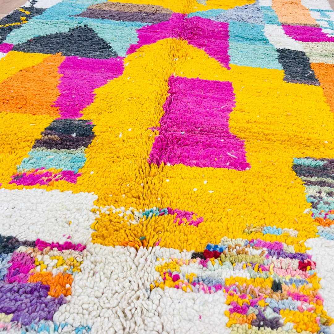Vintage Moroccan Rug with vibrant magenta, mustard, cream, and teal abstract design, 8.56 x 5.02 ft, handwoven Berber style.