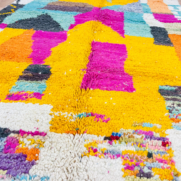 Vintage Moroccan Rug with vibrant magenta, mustard, cream, and teal abstract design, 8.56 x 5.02 ft, handwoven Berber style.