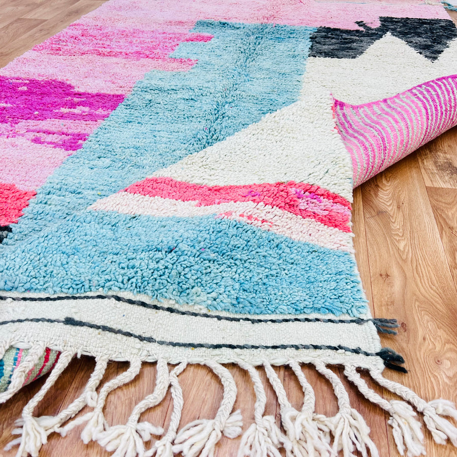 One-of-a-kind abstract pink Moroccan rug with aqua and ivory, handmade in the Atlas Mountains, showcasing vibrant traditional Berber design.