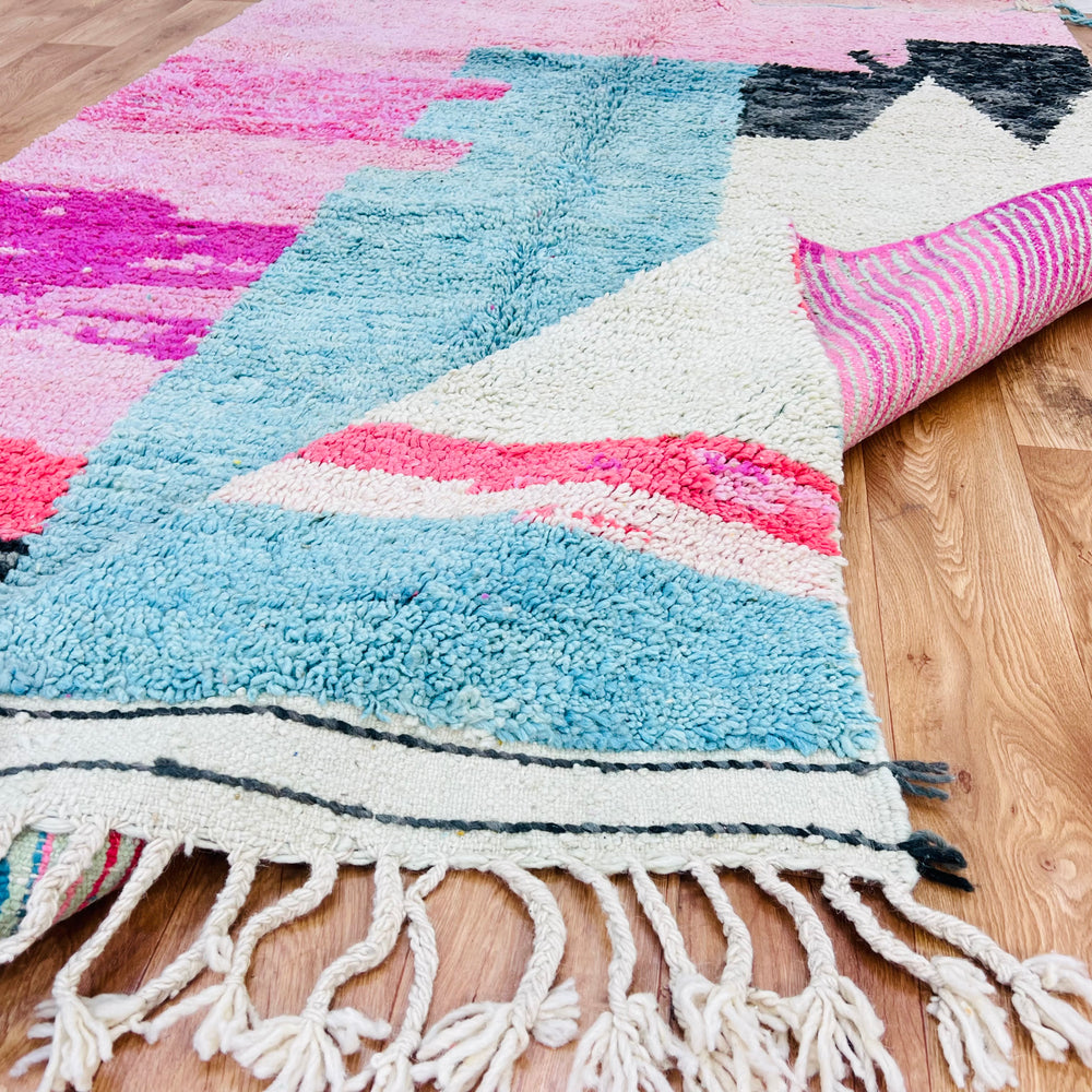 One-of-a-kind abstract pink Moroccan rug with aqua and ivory, handmade in the Atlas Mountains, showcasing vibrant traditional Berber design.