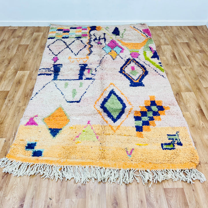 Colorful tribal diamond Moroccan rug with Berber symbols, measuring 248x150 cm, handwoven in warm wool with vibrant designs.