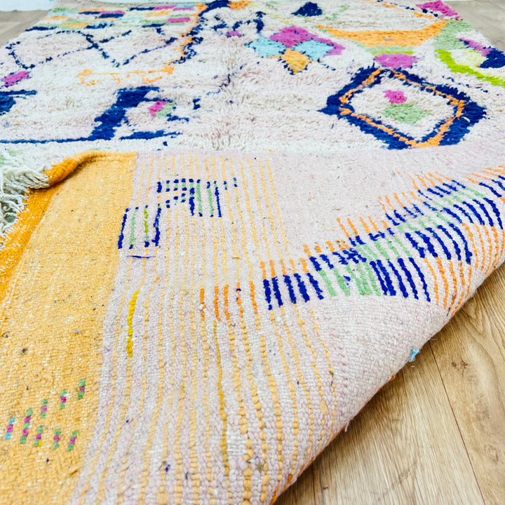 Colorful tribal diamond Moroccan rug with handwoven Berber symbols, 248x150 cm, adds vibrant charm to any space.