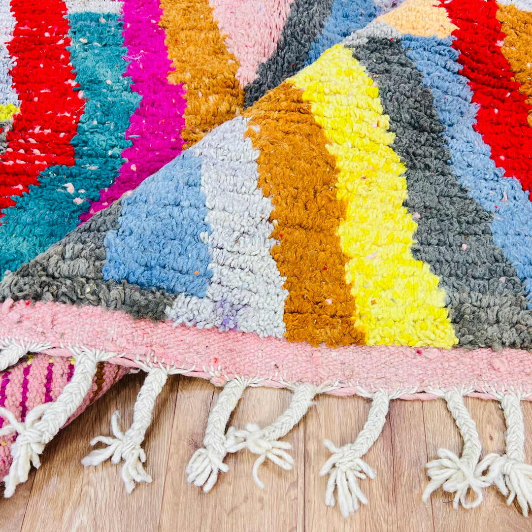 Colorful vintage Moroccan rug with a wave pattern in red, pink, teal, mustard, cream, and black. Handmade Berber wool rug, 8.4x5.1 ft.