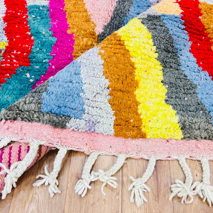 Colorful vintage Moroccan rug with a wave pattern in red, pink, teal, mustard, cream, and black. Handmade Berber wool rug, 8.4x5.1 ft.