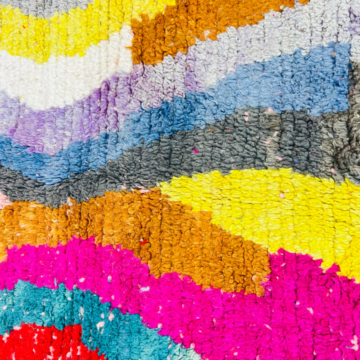 Colorful vintage Moroccan rug with wave pattern in red, pink, teal, mustard, cream, black, handmade by Berber artisans, 100% wool.