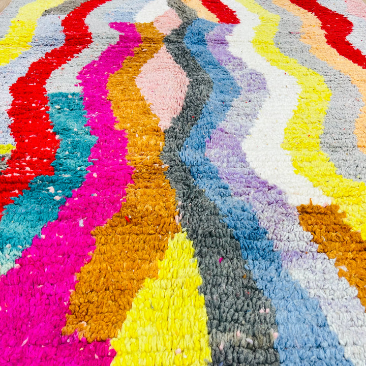 Vintage Moroccan rug with colorful wave pattern in red, pink, teal, mustard, cream, by Berber artisans. Moroccan rugs for sale.