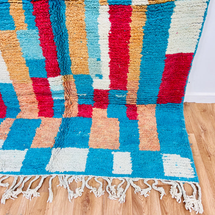 Vintage Moroccan rug with vibrant blocks of turquoise, ochre, red, cream; handmade wool carpet by Berber artisans, 207x161 cm.