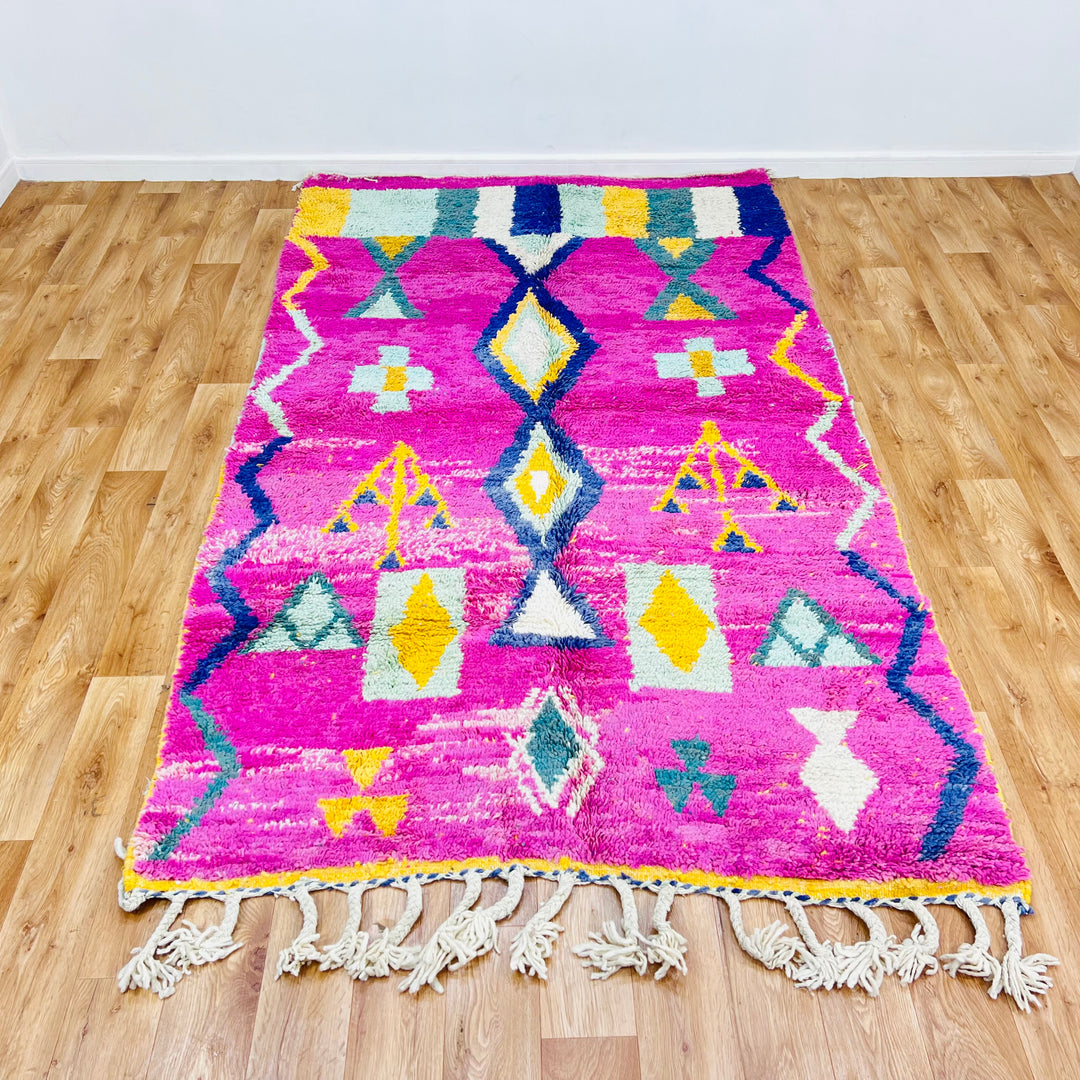 Pink Moroccan Berber rug with tribal diamond and tree motifs in vibrant colors, handwoven wool rug, 164x155 cm.