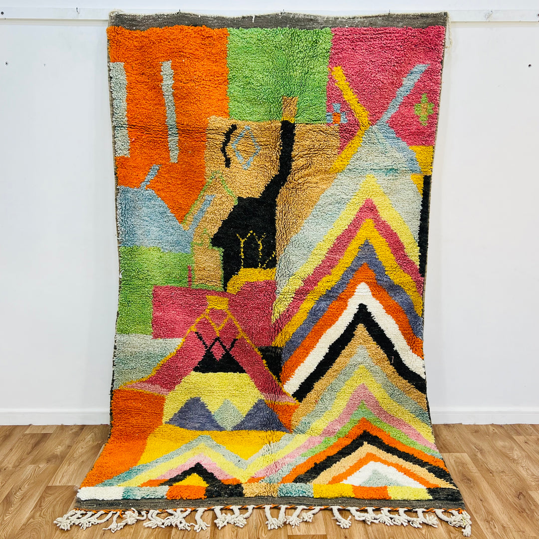 Colorful Chevron Moroccan Berber Rug with zigzag pattern and vibrant colors, traditional handwoven wool, 8x10 area rug.